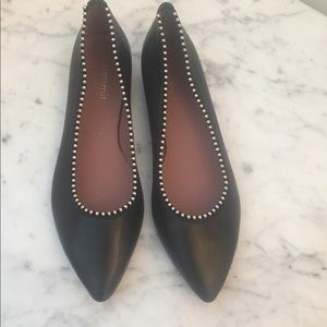 Italian leather flat with sliver detail.